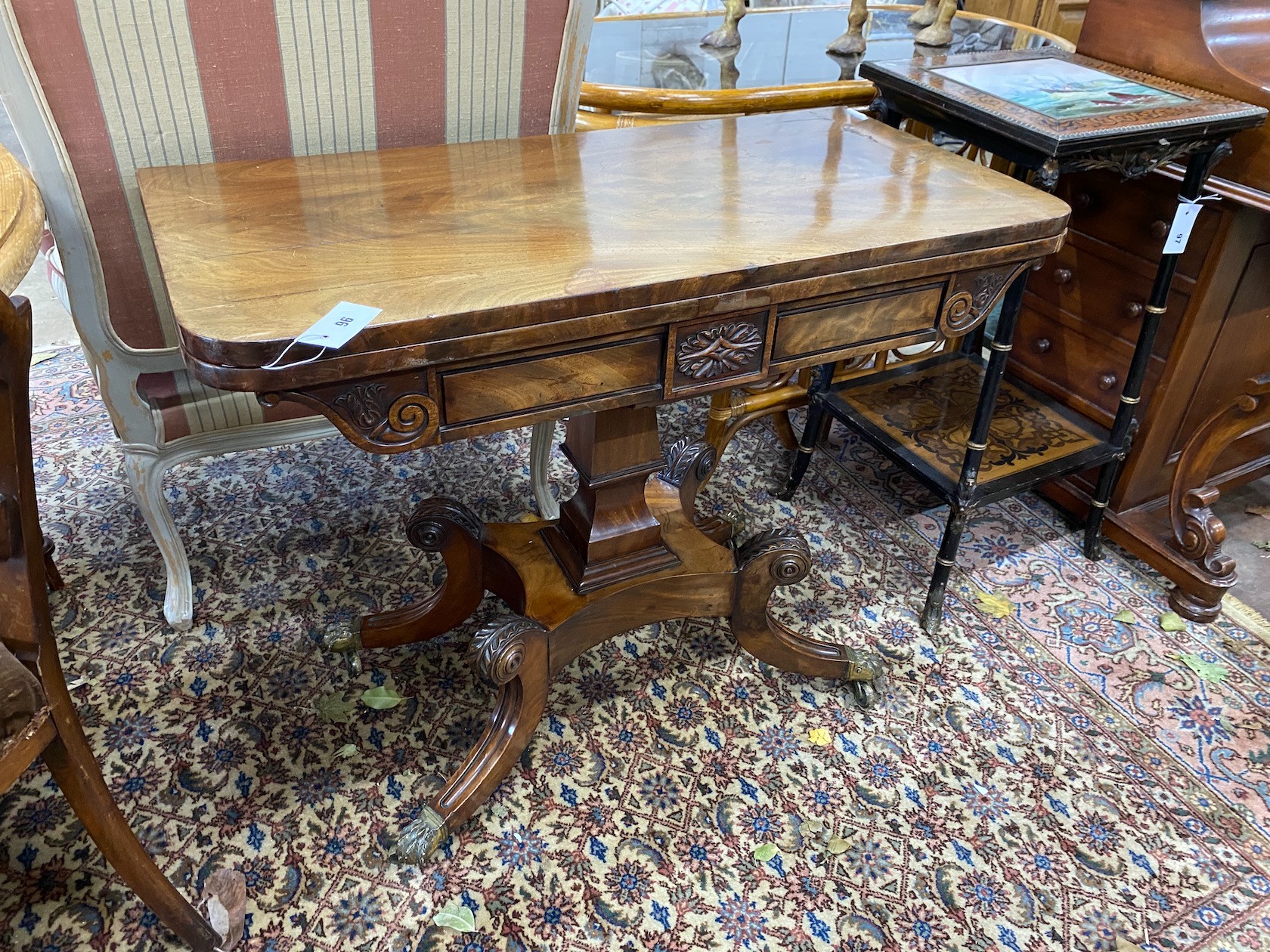 A Regency mahogany folding card table, width 92cm, depth 45cm, height 74cm *Please note the sale commences at 9am.
